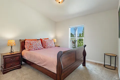 a view of a balcony with wooden floor and outdoor space
