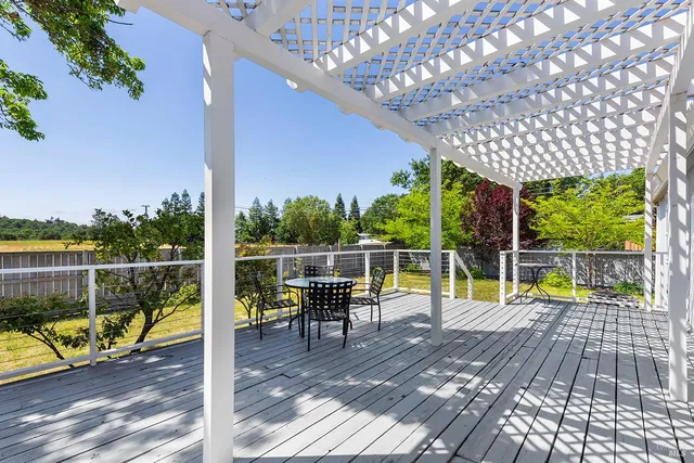 a view of balcony with wooden floor and outdoor space