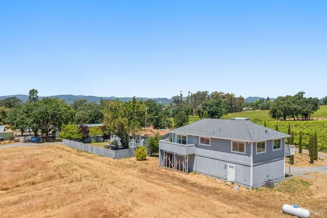 a view of outside space with a lake view