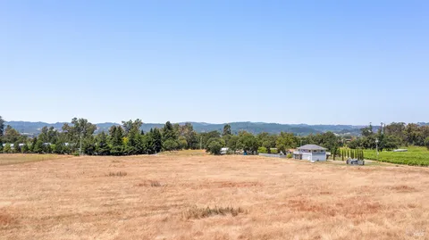 a view of an outdoor space and mountains