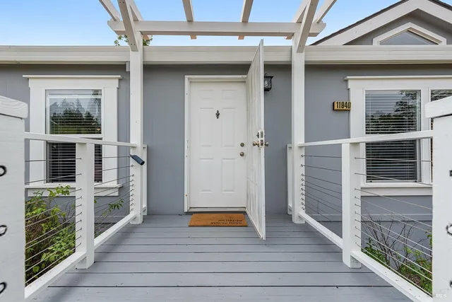 front view of a house with a yard