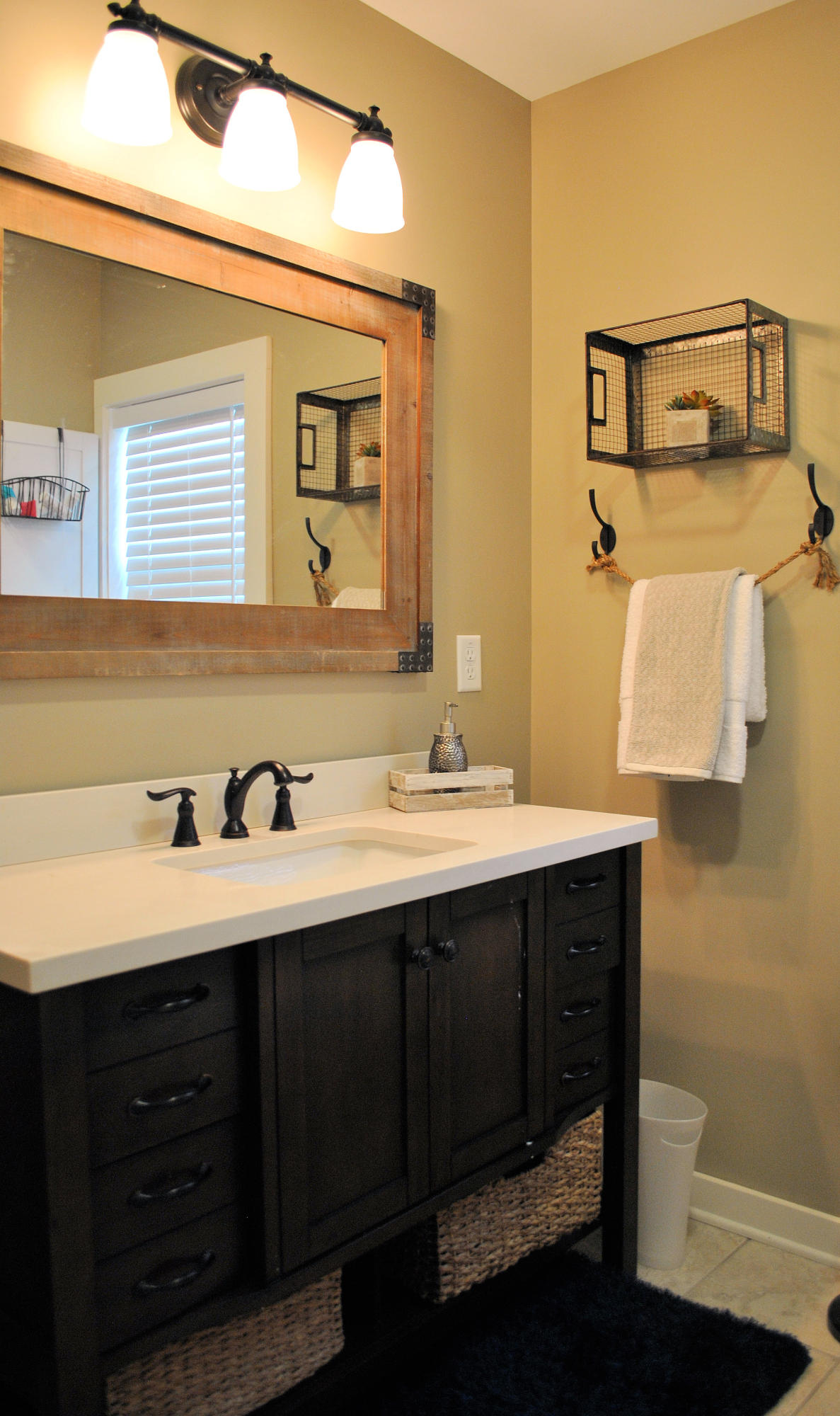 4051 Sunflower Road Pilot, VA 24138 - Photo 22 of 62 a bathroom with a sink vanity and mirror