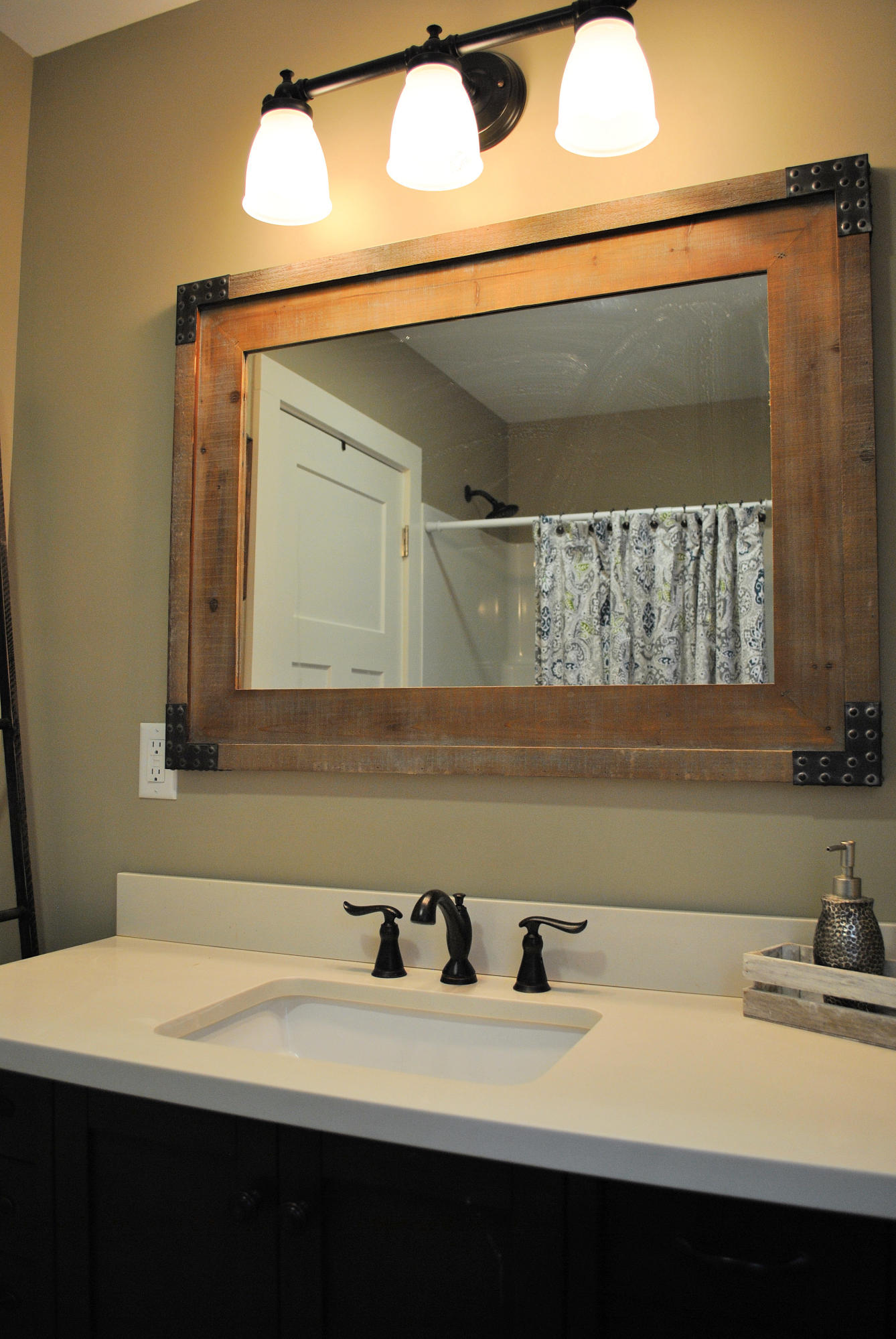 4051 Sunflower Road Pilot, VA 24138 - Photo 23 of 62 a bathroom with a sink and a mirror