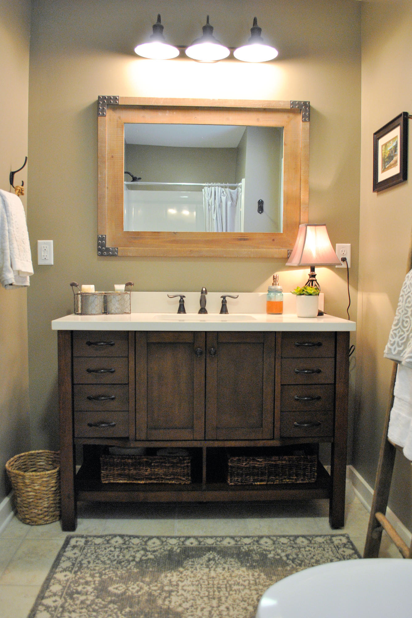 4051 Sunflower Road Pilot, VA 24138 - Photo 29 of 62 a bathroom with a sink vanity and mirror