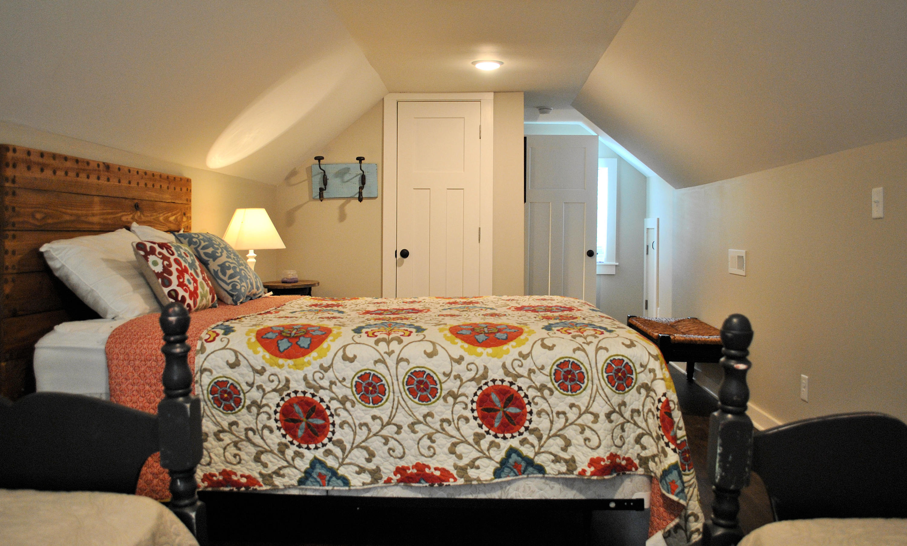 4051 Sunflower Road Pilot, VA 24138 - Photo 34 of 62 a bedroom with a bed and a painting on the wall