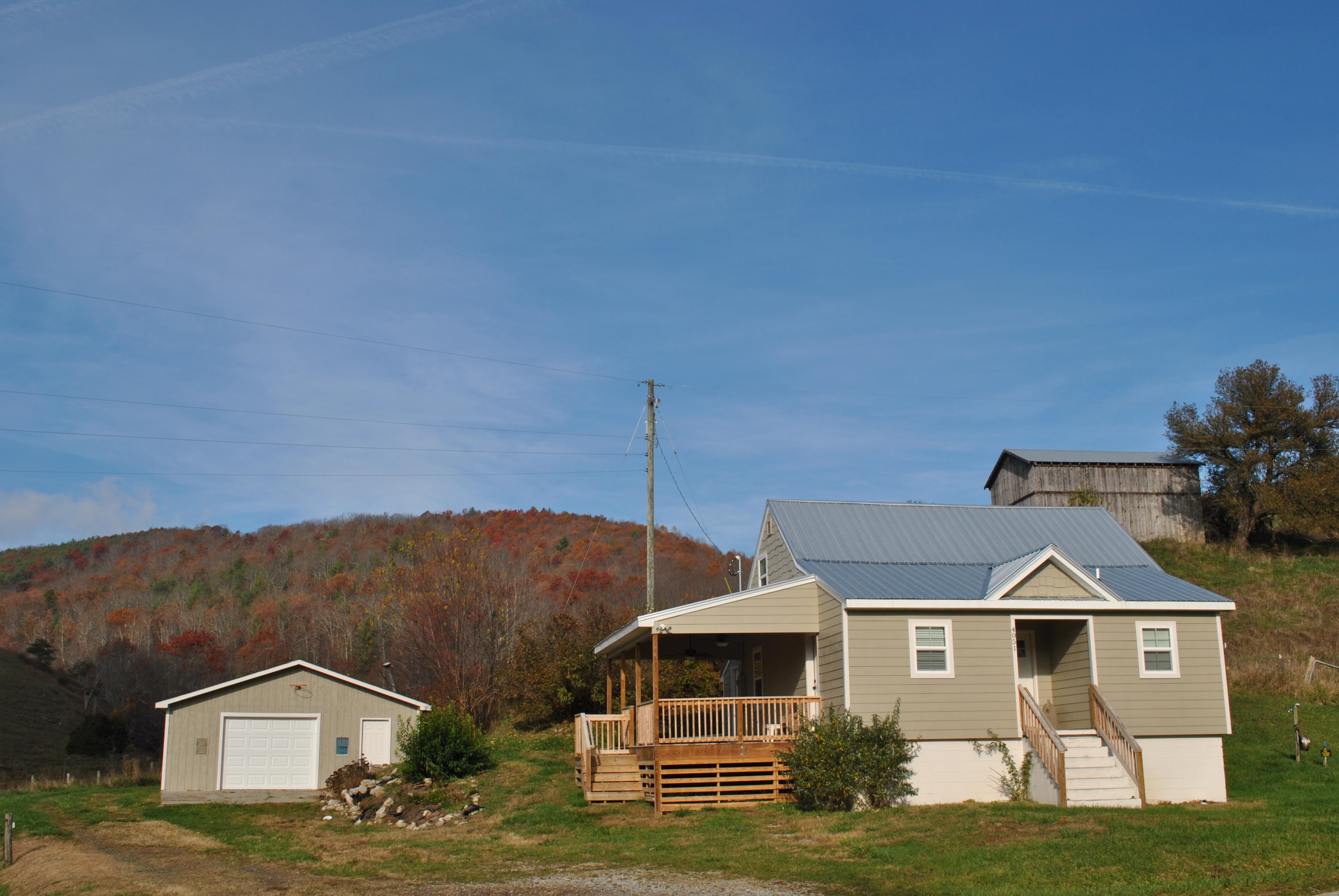 4051 Sunflower Road Pilot, VA 24138 - Photo 5 of 62 a front view of a house with a yard