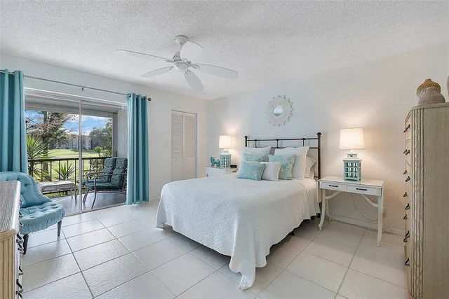 a bedroom with a bed and a cabinets