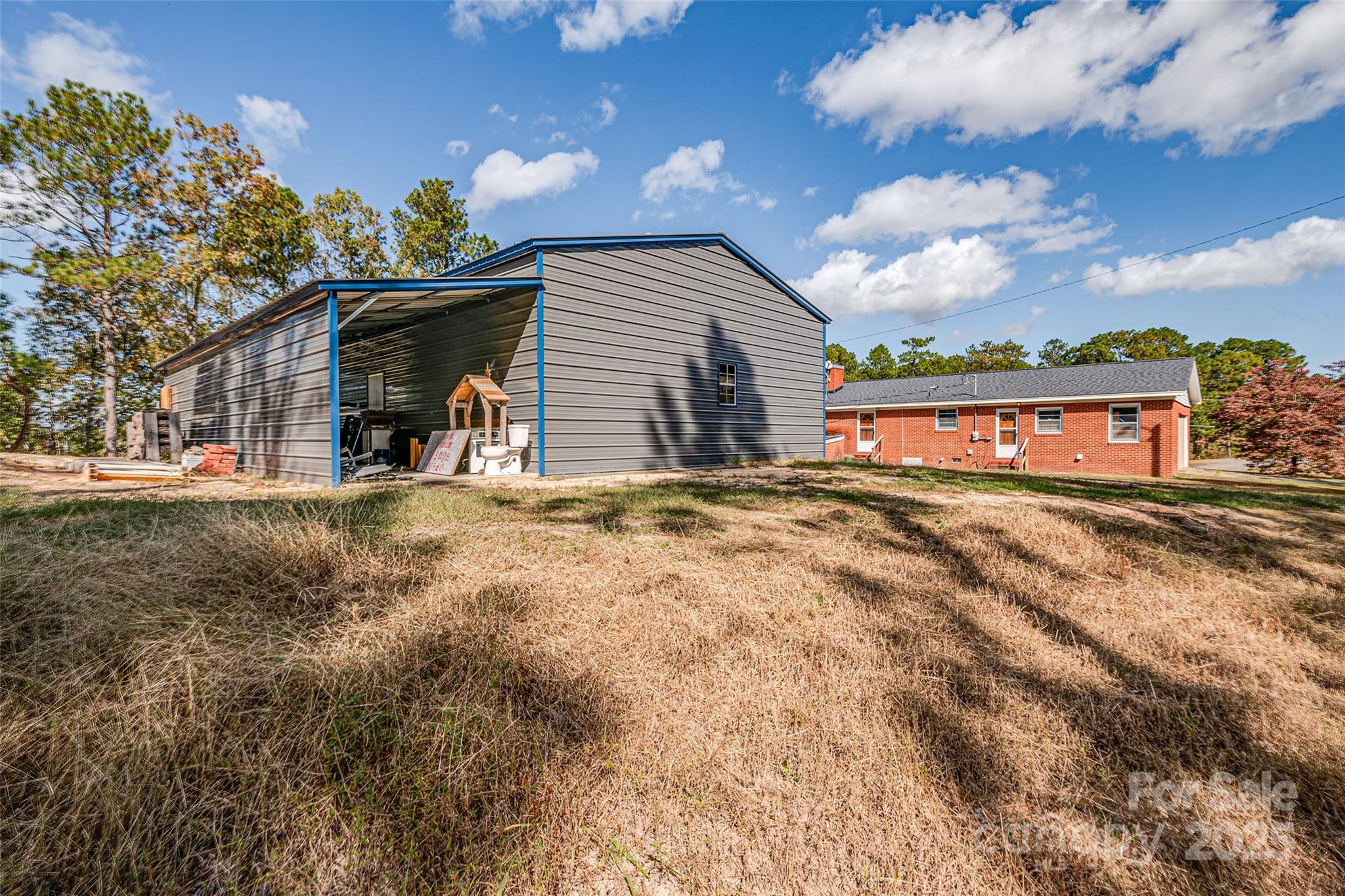 8684 Teals Mill Road Cheraw, SC 29520 - Photo 11 of 36 a view of a house with a yard