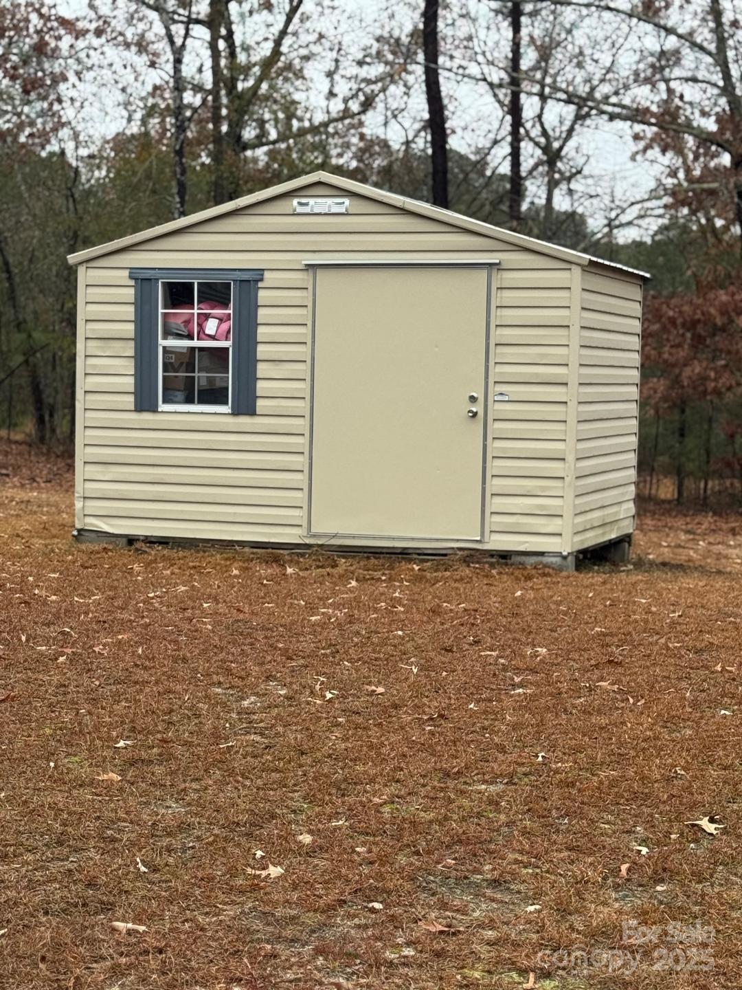 8684 Teals Mill Road Cheraw, SC 29520 - Photo 14 of 36 a view of a house with a yard