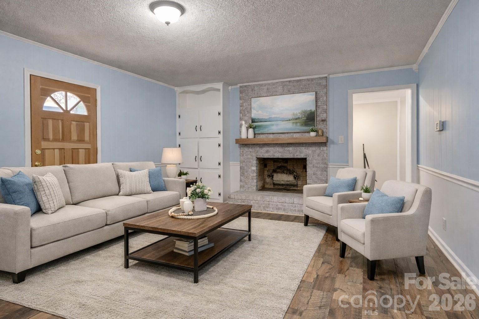 8684 Teals Mill Road Cheraw, SC 29520 - Photo 2 of 34 a living room with furniture and a fireplace