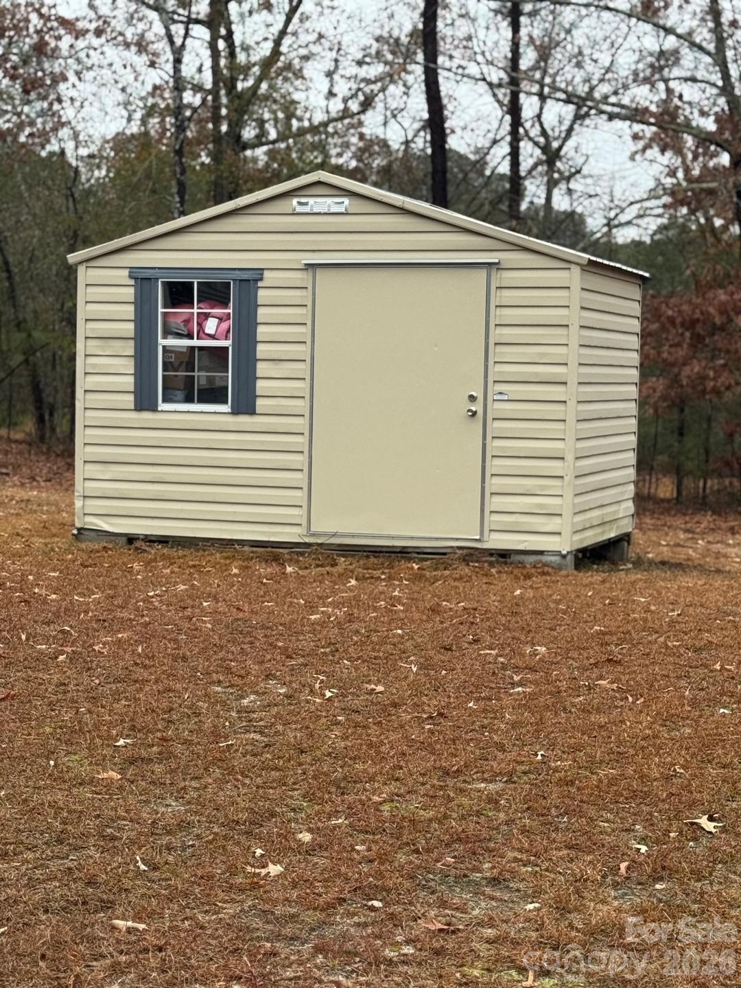 8684 Teals Mill Road Cheraw, SC 29520 - Photo 27 of 34 a view of a house with a yard