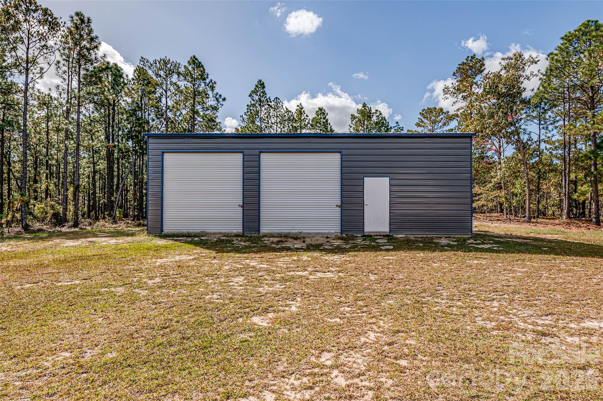 8684 Teals Mill Road Cheraw, SC 29520 - Photo 28 of 34 a view of a house with a garden