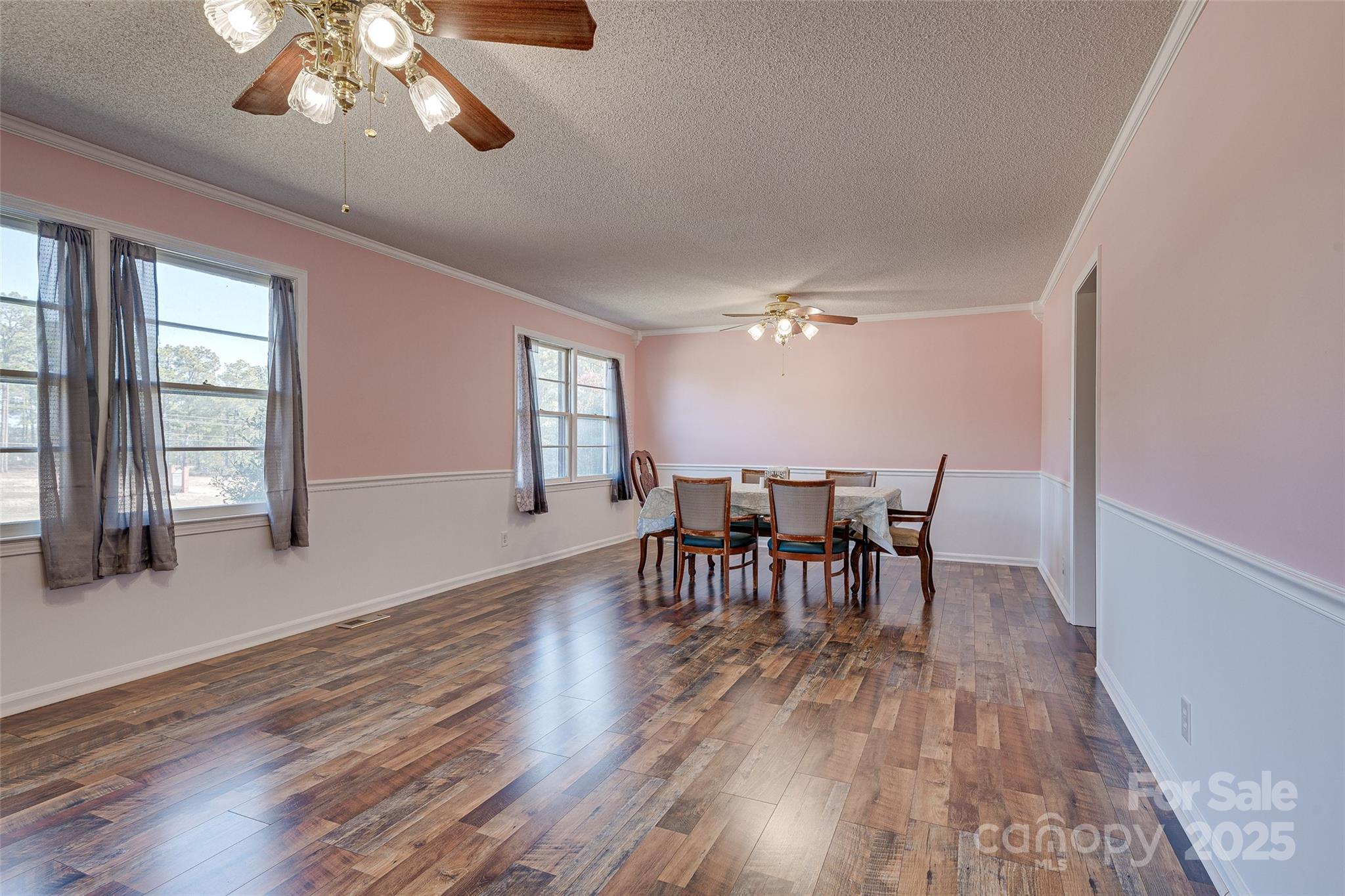 8684 Teals Mill Road Cheraw, SC 29520 - Photo 28 of 36 a view of a dining room with furniture window and wooden floor