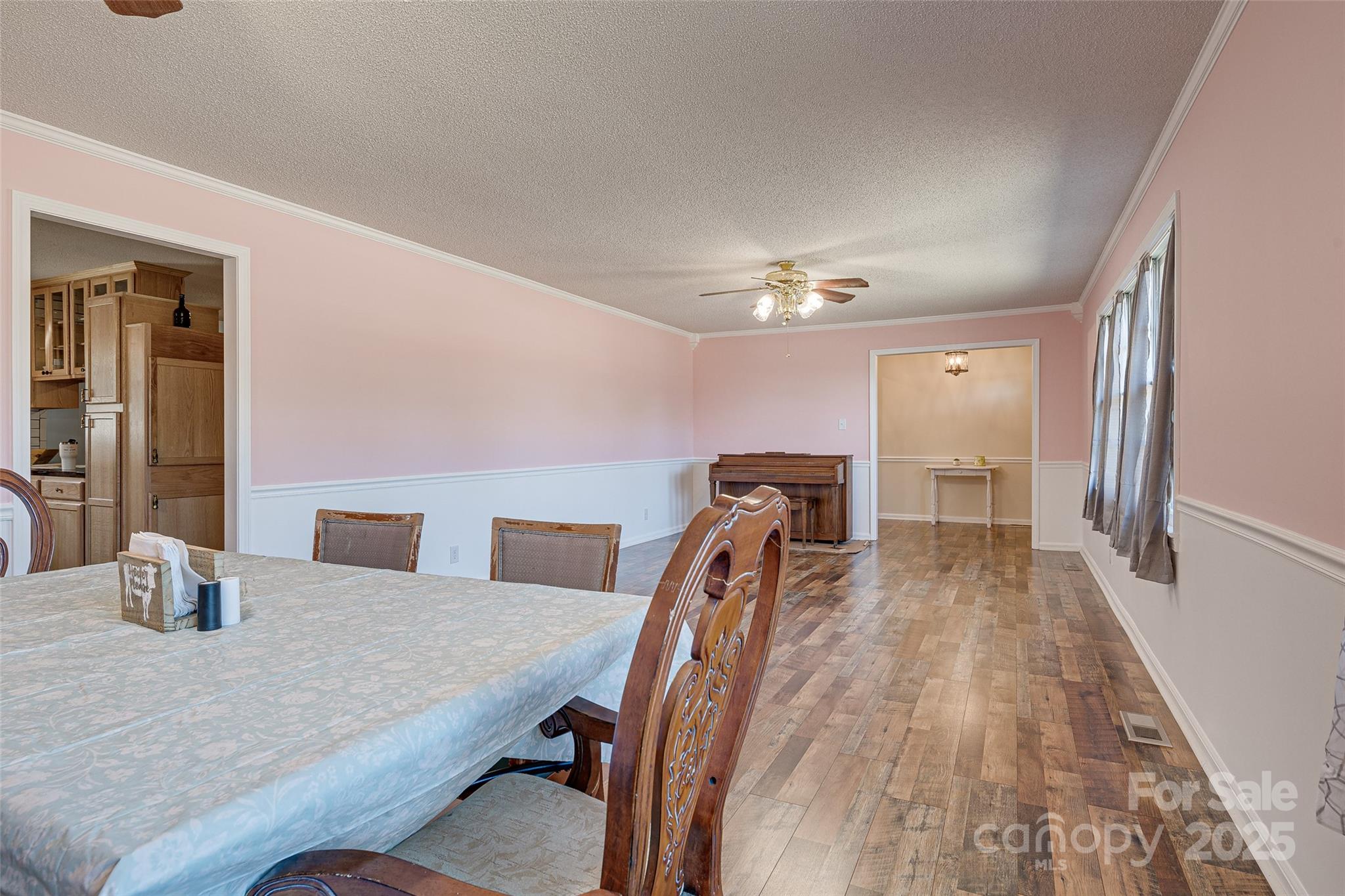 8684 Teals Mill Road Cheraw, SC 29520 - Photo 30 of 36 a dining room with furniture and wooden floor