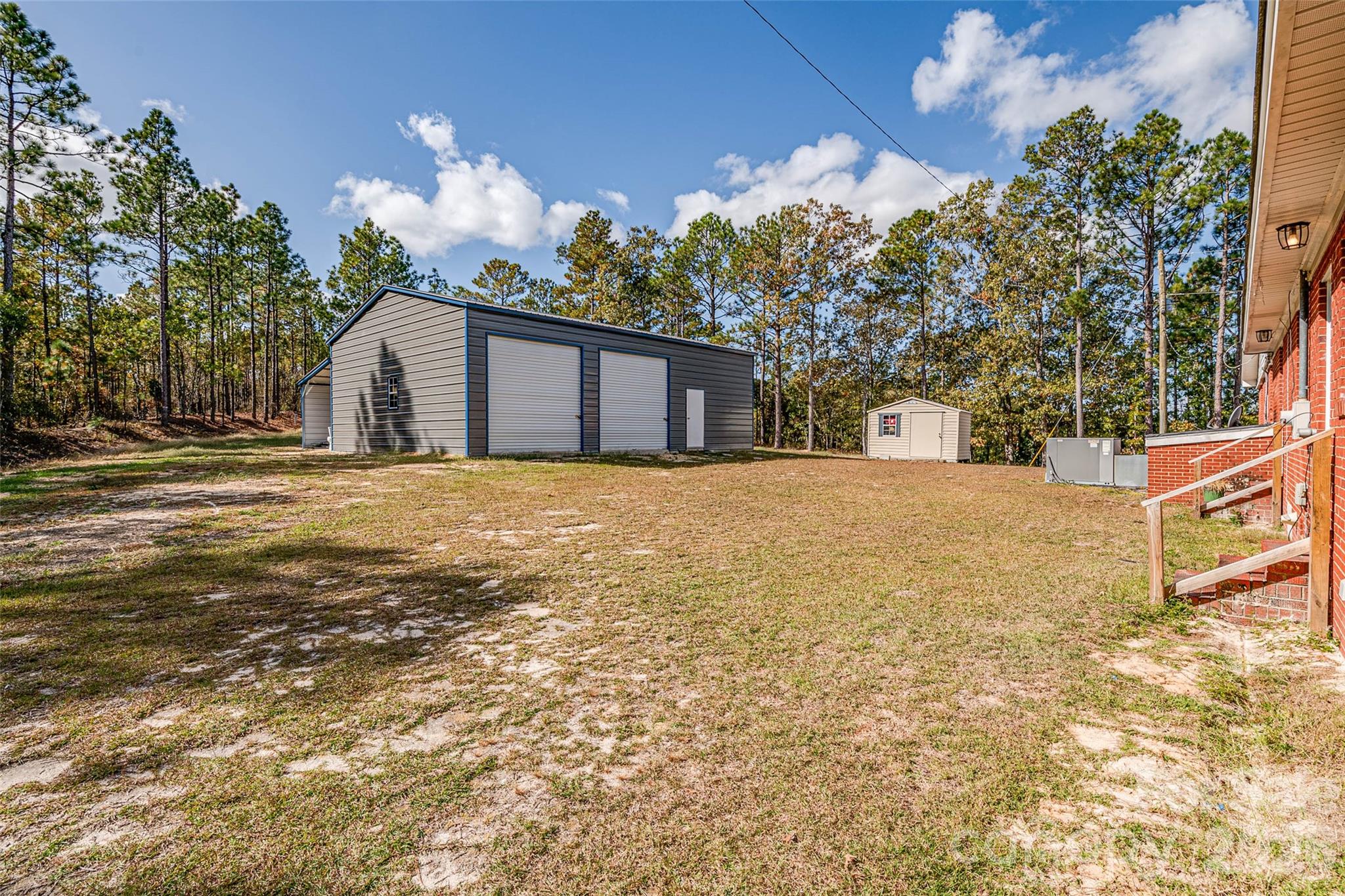8684 Teals Mill Road Cheraw, SC 29520 - Photo 30 of 34 a view of a house with a snow in the yard