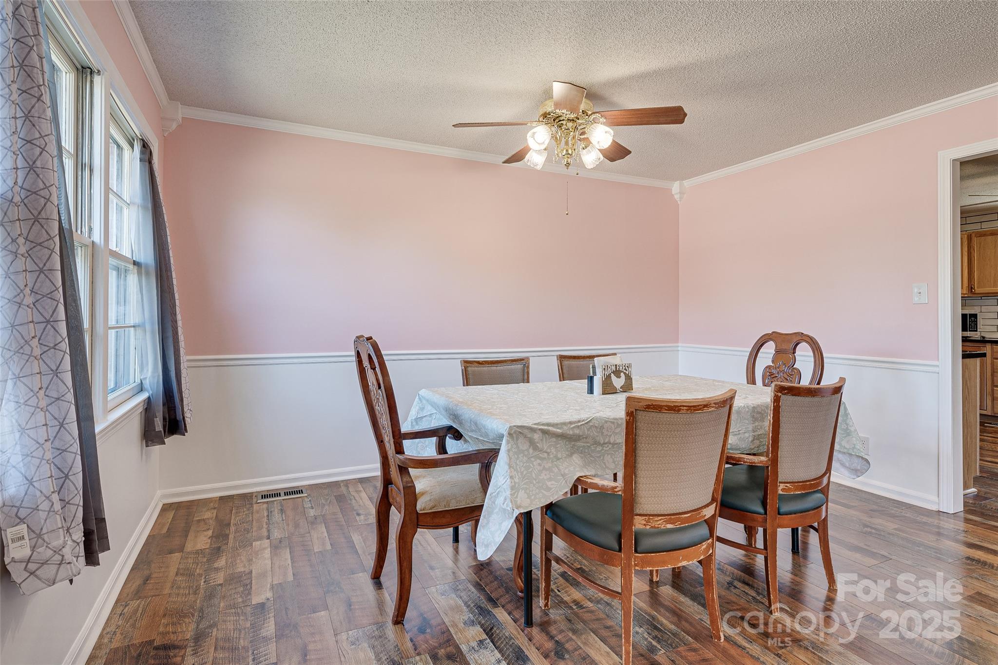 8684 Teals Mill Road Cheraw, SC 29520 - Photo 31 of 36 a view of a dining room with furniture and wooden floor