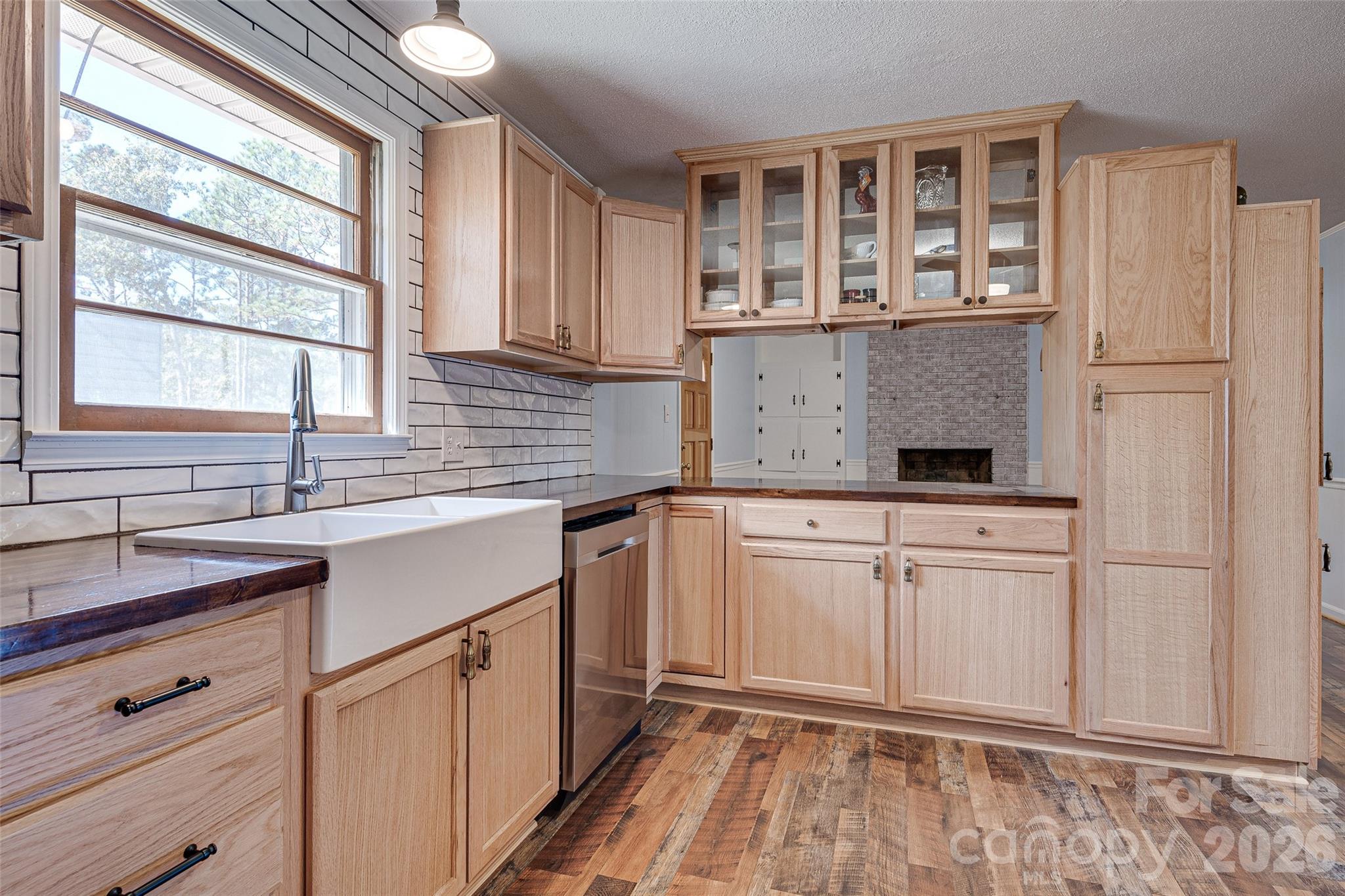 8684 Teals Mill Road Cheraw, SC 29520 - Photo 7 of 34 a kitchen with stainless steel appliances granite countertop a sink stove and cabinets