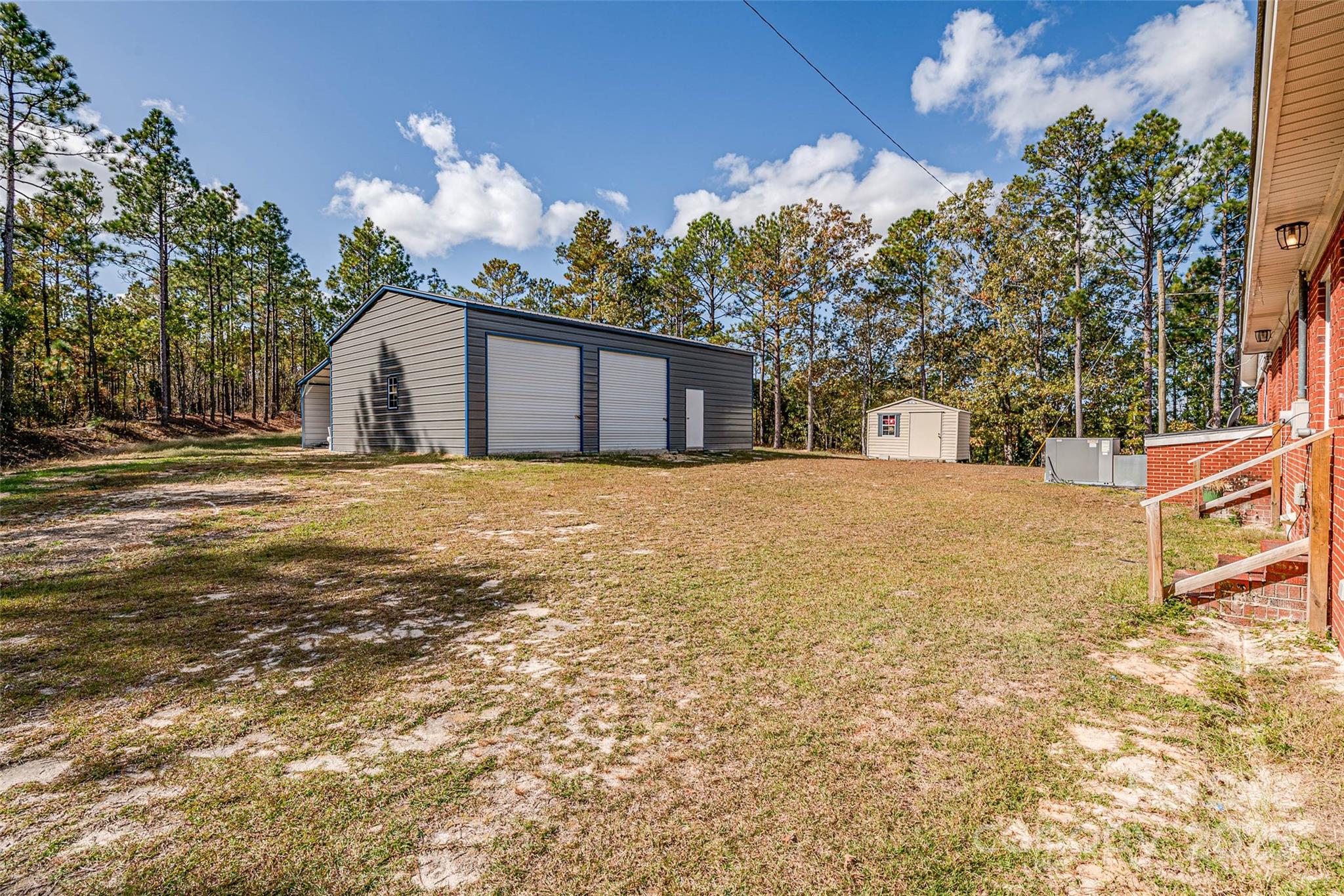8684 Teals Mill Road Cheraw, SC 29520 - Photo 10 of 36 a view of a house with a snow in the yard