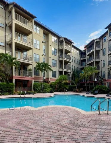 a view of a building with a yard