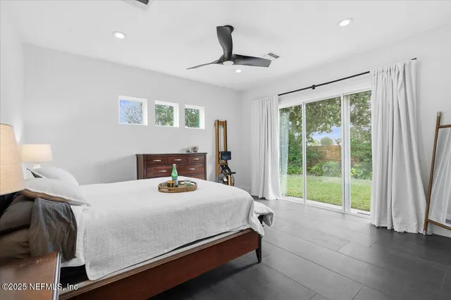 a kitchen with a stove and a white cabinets