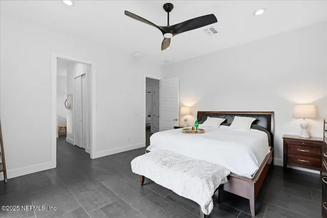 a kitchen with stainless steel appliances a stove a refrigerator and cabinets