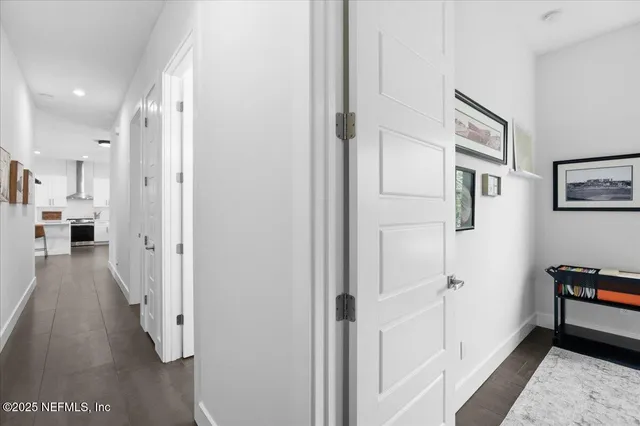 a view of a house with a yard and deck