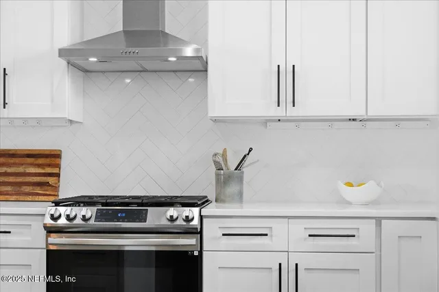 an aerial view of a house with a yard basket ball court