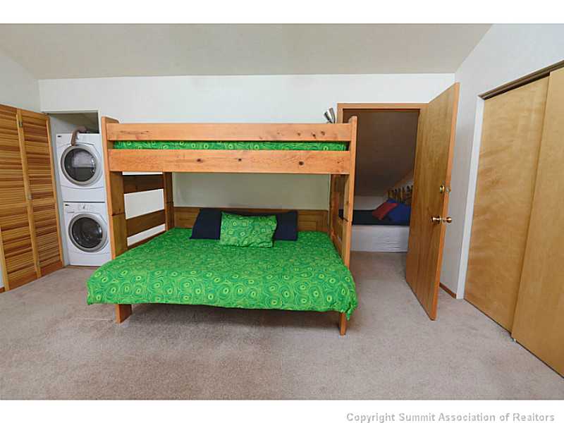 9460 Ryan Gulch Road, Unit 82 Silverthorne, CO 80498 - Photo 20 of 25 Other. Spacious loft opens to bonus room. Rarely do find a full sized washer and dryer in your condo.