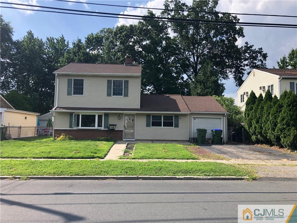 160 Winthrop Road Edison, NJ 08817 - Photo 2 of 18 a front view of a house with a yard