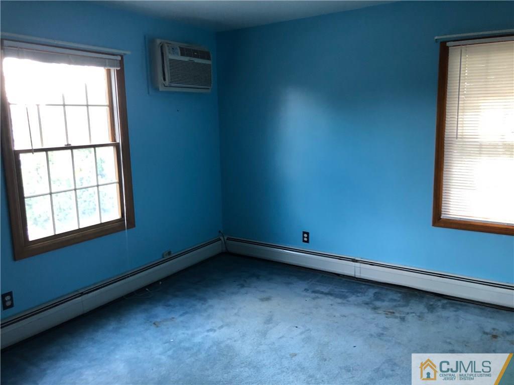160 Winthrop Road Edison, NJ 08817 - Photo 16 of 18 an empty room with a window
