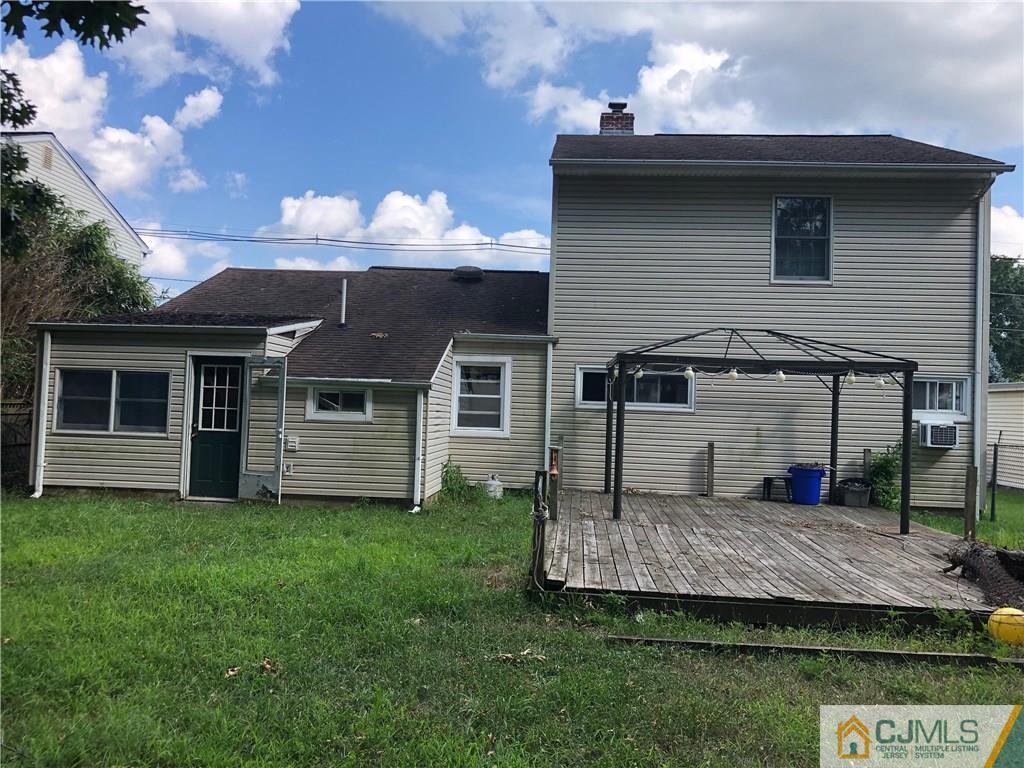 160 Winthrop Road Edison, NJ 08817 - Photo 3 of 18 a front view of a house with a yard