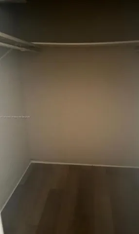 a bathroom with a sink and cabinets