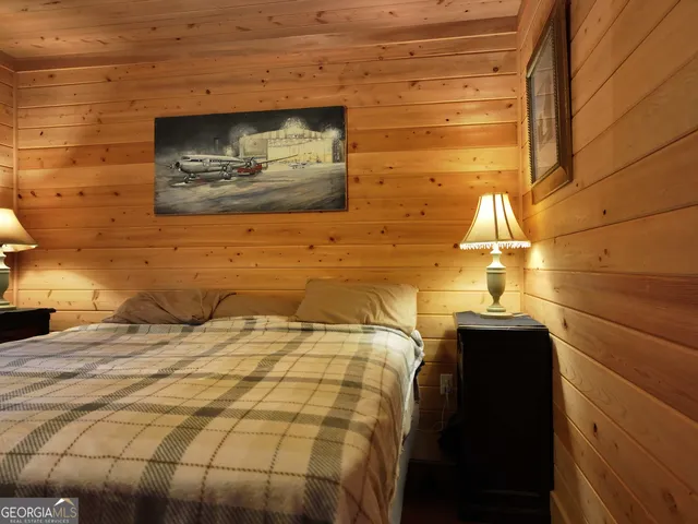 a kitchen with granite countertop cabinets and window