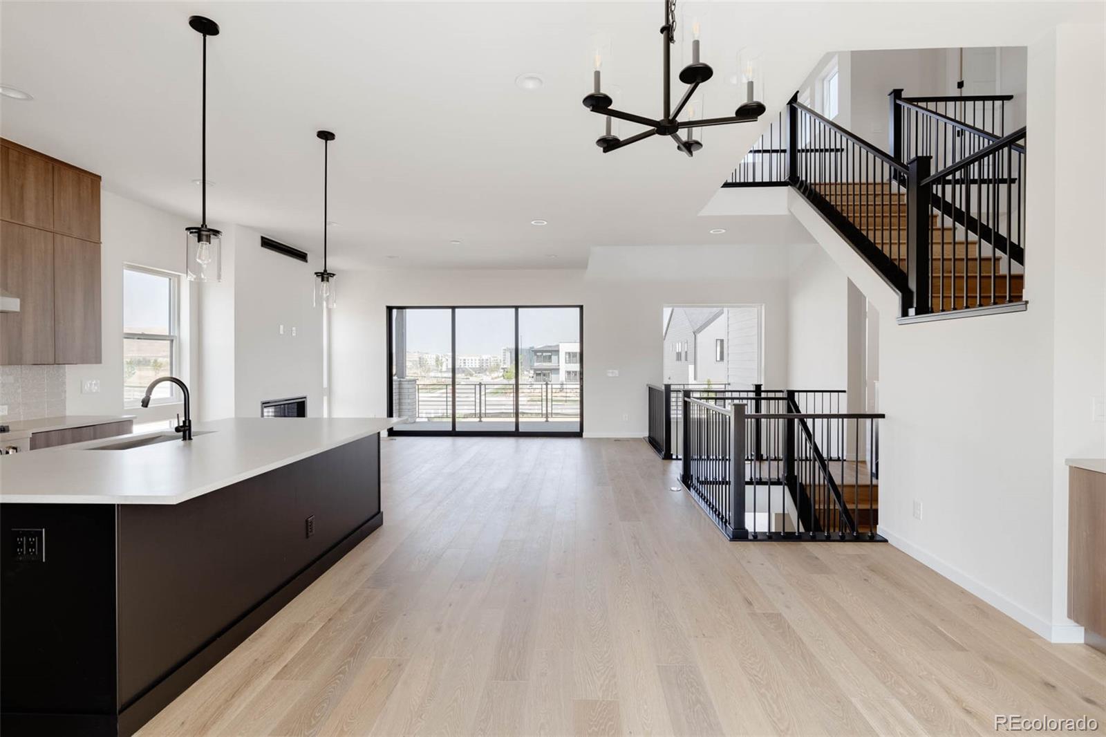 11468 Alla Breve Lone Tree, CO 80134 - Photo 10 of 34 a view of entryway and hall with wooden floor