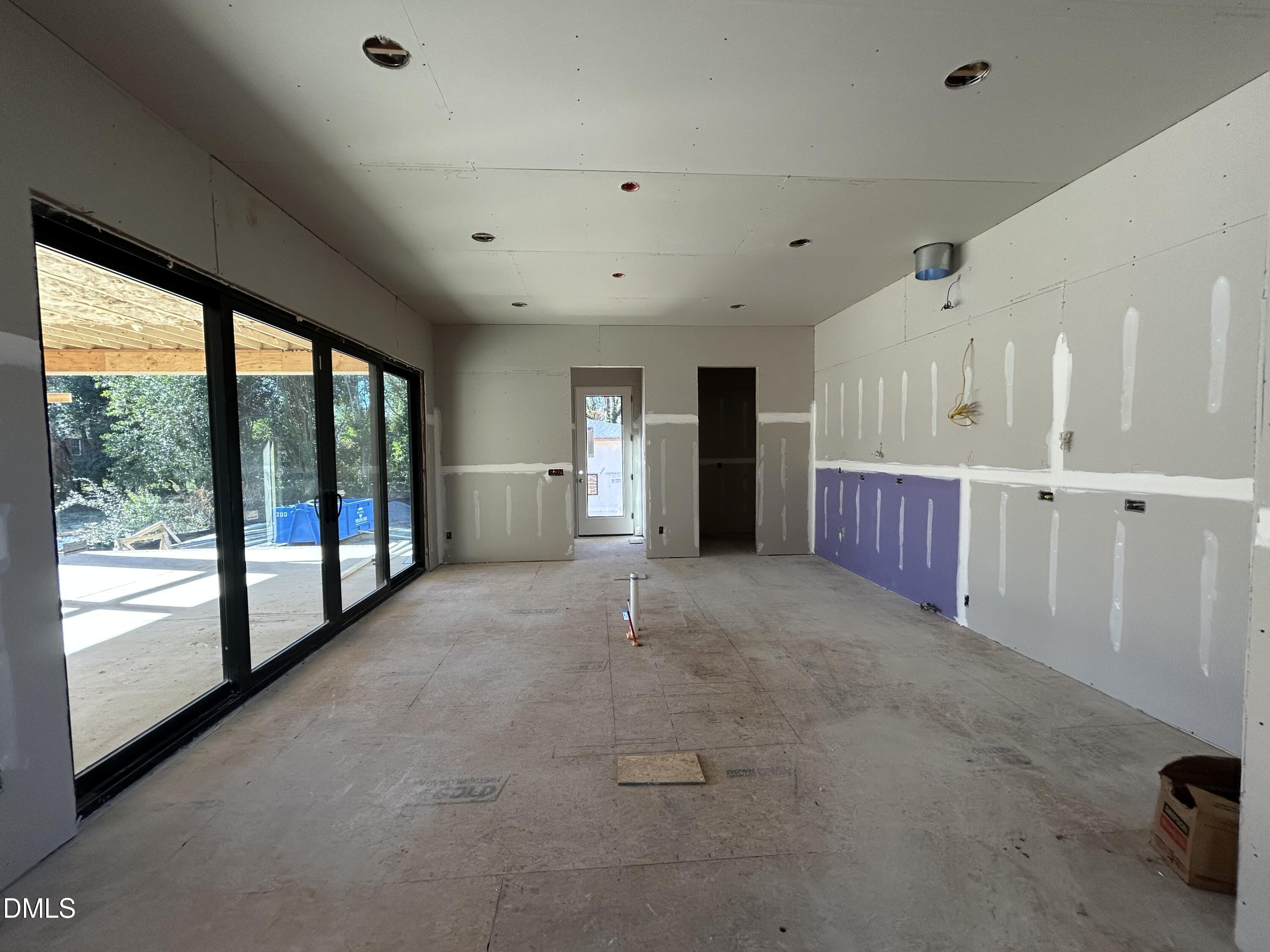 909 Oberlin Road Raleigh, NC 27605 - Photo 4 of 10 a view of an empty room with a window