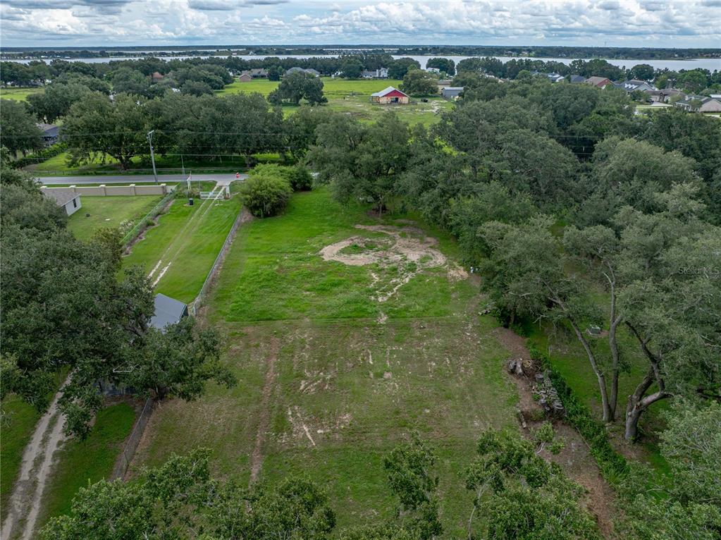 Old Berkley Road Auburndale, FL 33823 - Photo 2 of 13 an aerial view of a golf course with a yard