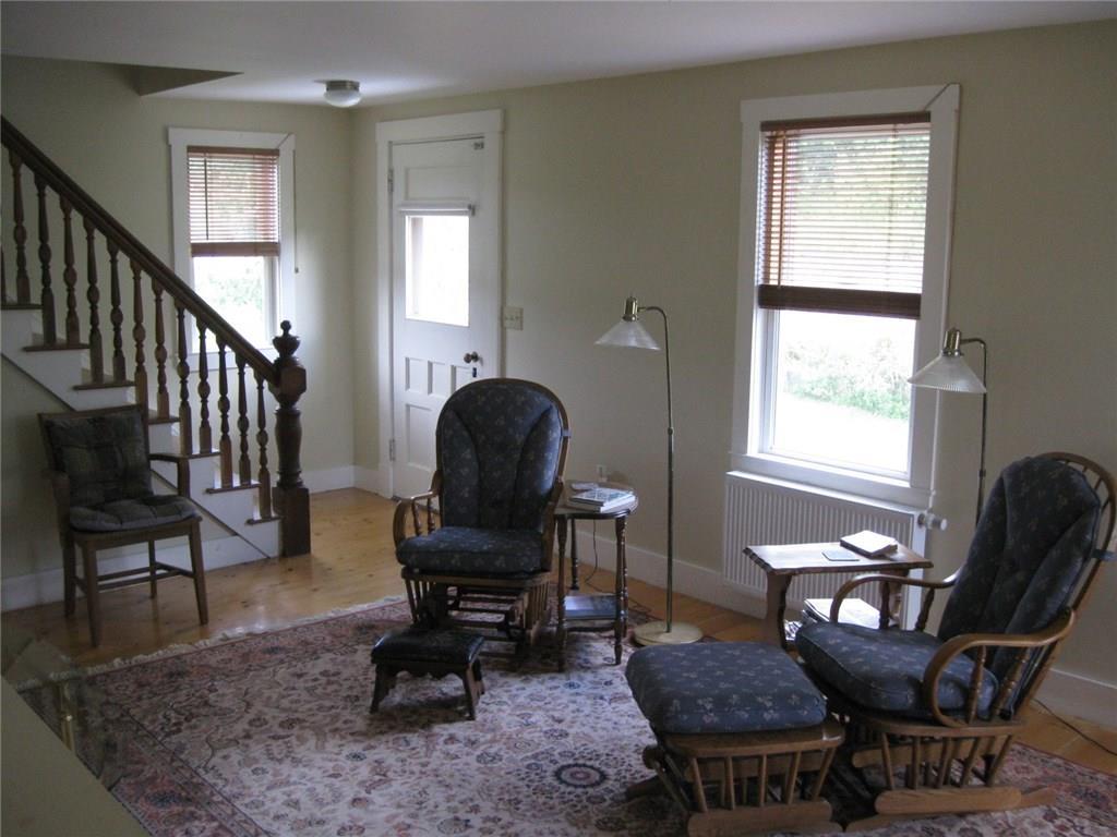 777 Pleasant View Ridge Road South China, ME 04358 - Photo 8 of 29 Living Room and stairs to 2nd floor