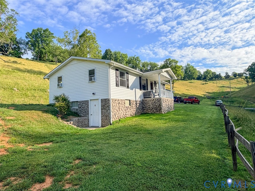 453 Long Hollow Road Cleveland, VA 24225 - Photo 11 of 50 a view of a house with a yard and a fountain