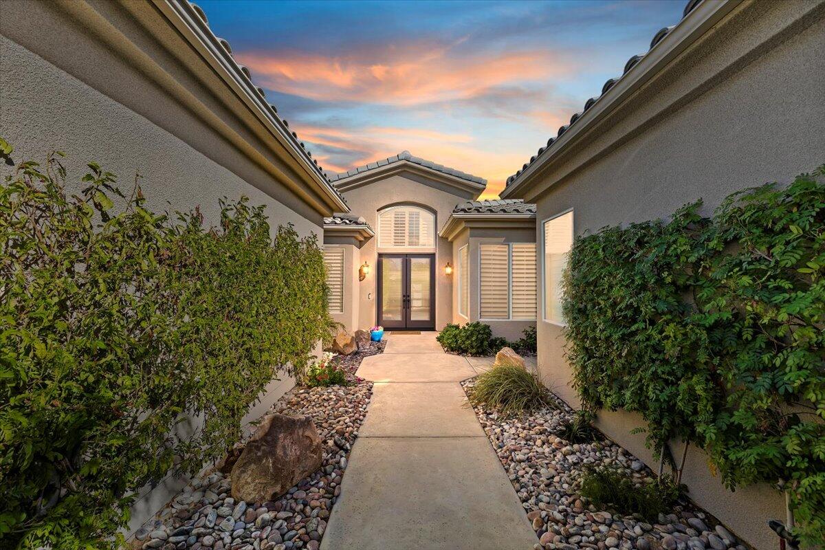2 Thatcher Court Rancho Mirage, CA 92270 - Photo 9 of 60 03-Front Walkway and Entry at Twilight