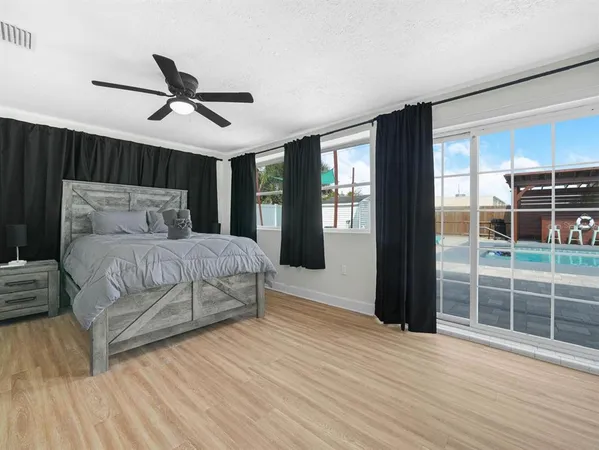a living room with a couch and a fireplace