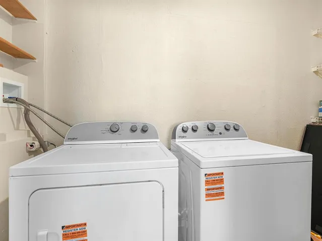 a kids bedroom with a bed and a chandelier