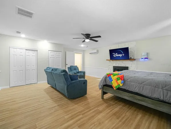 a utility room with dryer and cars