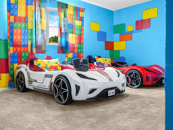 a bathroom with a sink mirror and toilet