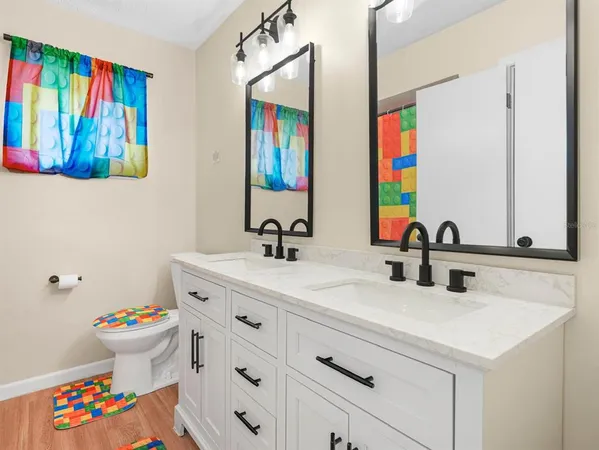 a view of a chairs and table in patio with a small yard