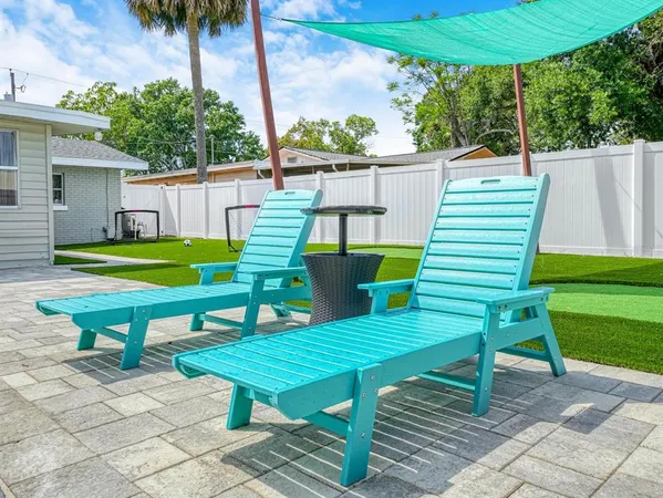 a view of backyard with green space