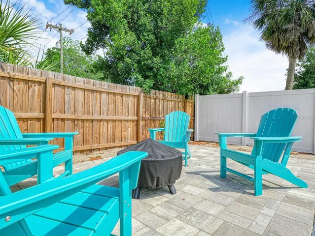 a backyard of a house with lots of green space