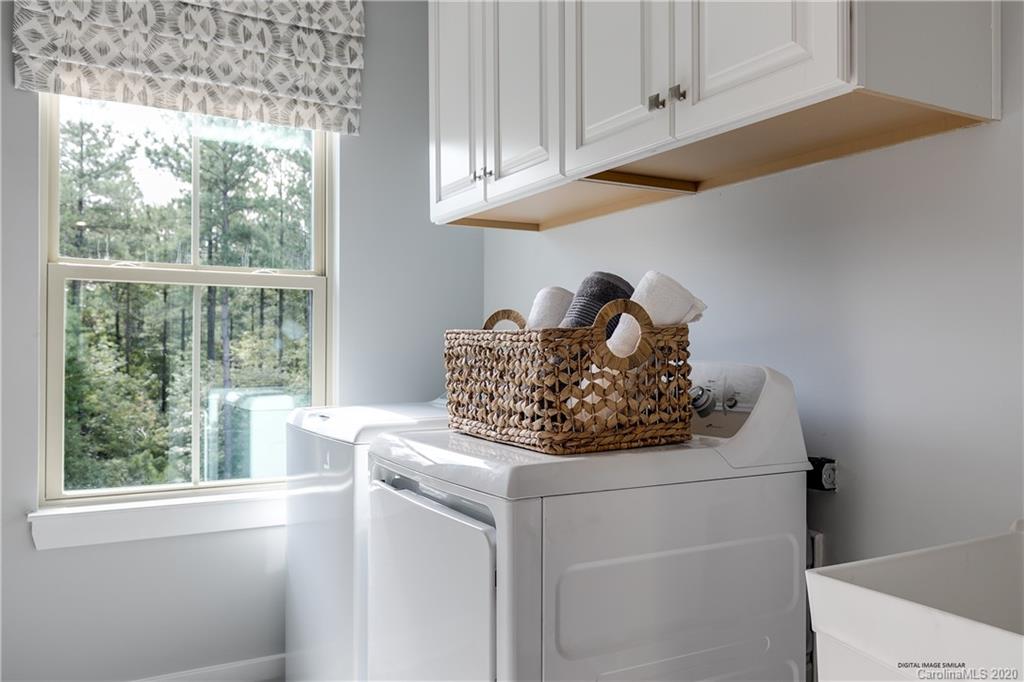 7126 Messina Road, Unit 134 Indian Land, SC 29707 - Photo 9 of 11 a close view of washer and dryer