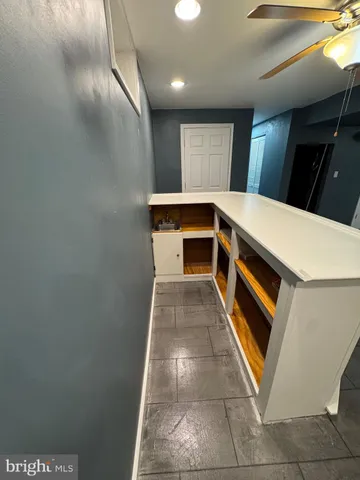 a bathroom with a tub and a shower