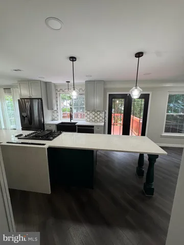 a utility room with a sink a washer and dryer