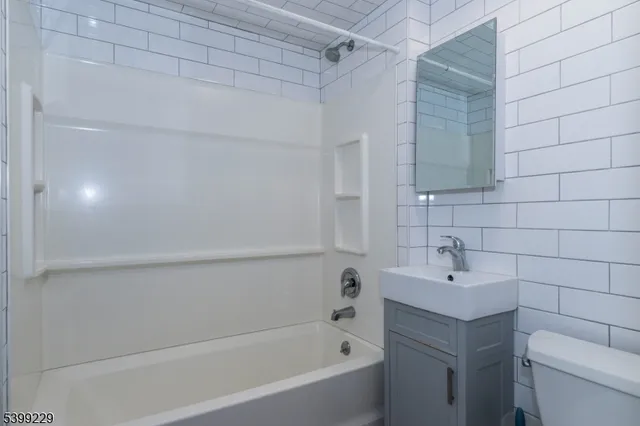 a bathroom with a sink and a bathtub